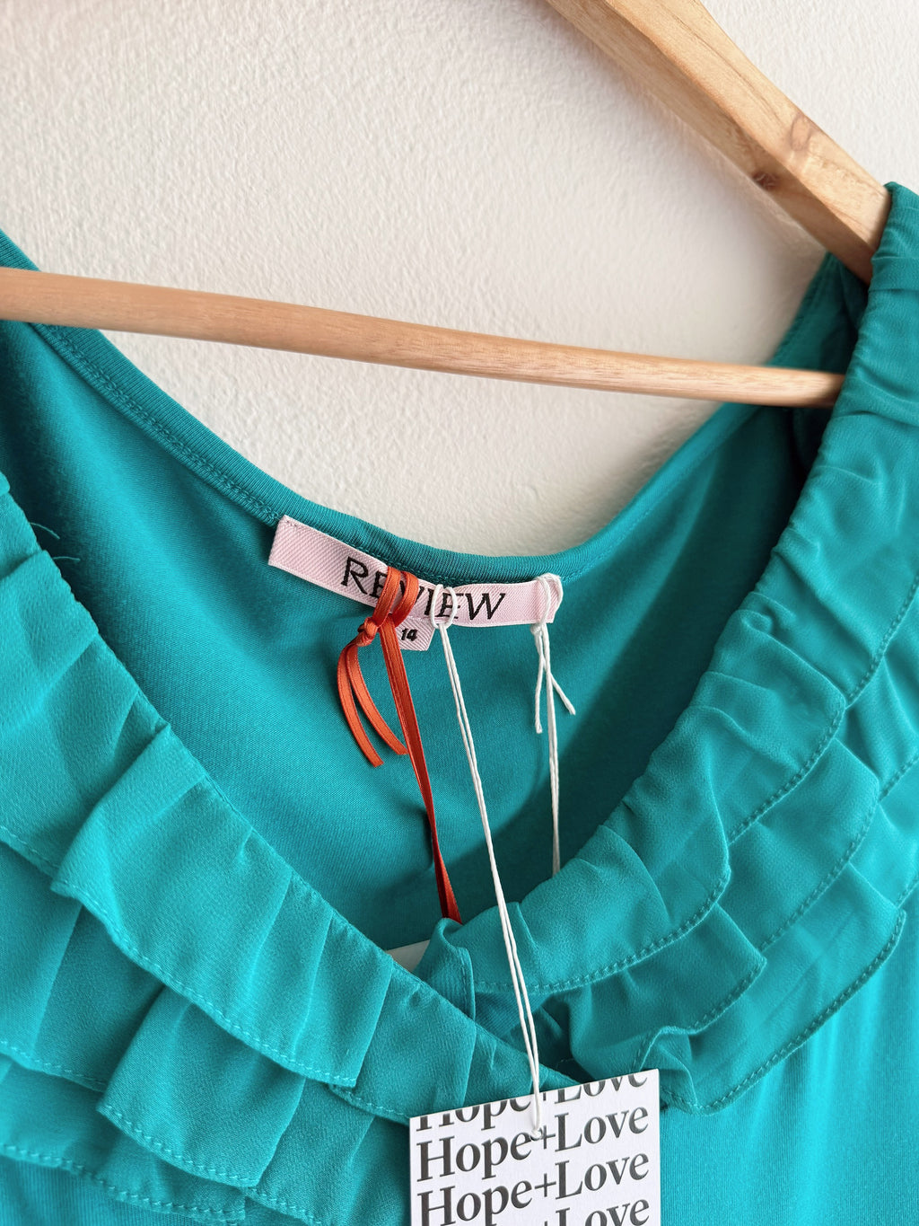 Review Teal Ruffle Top
