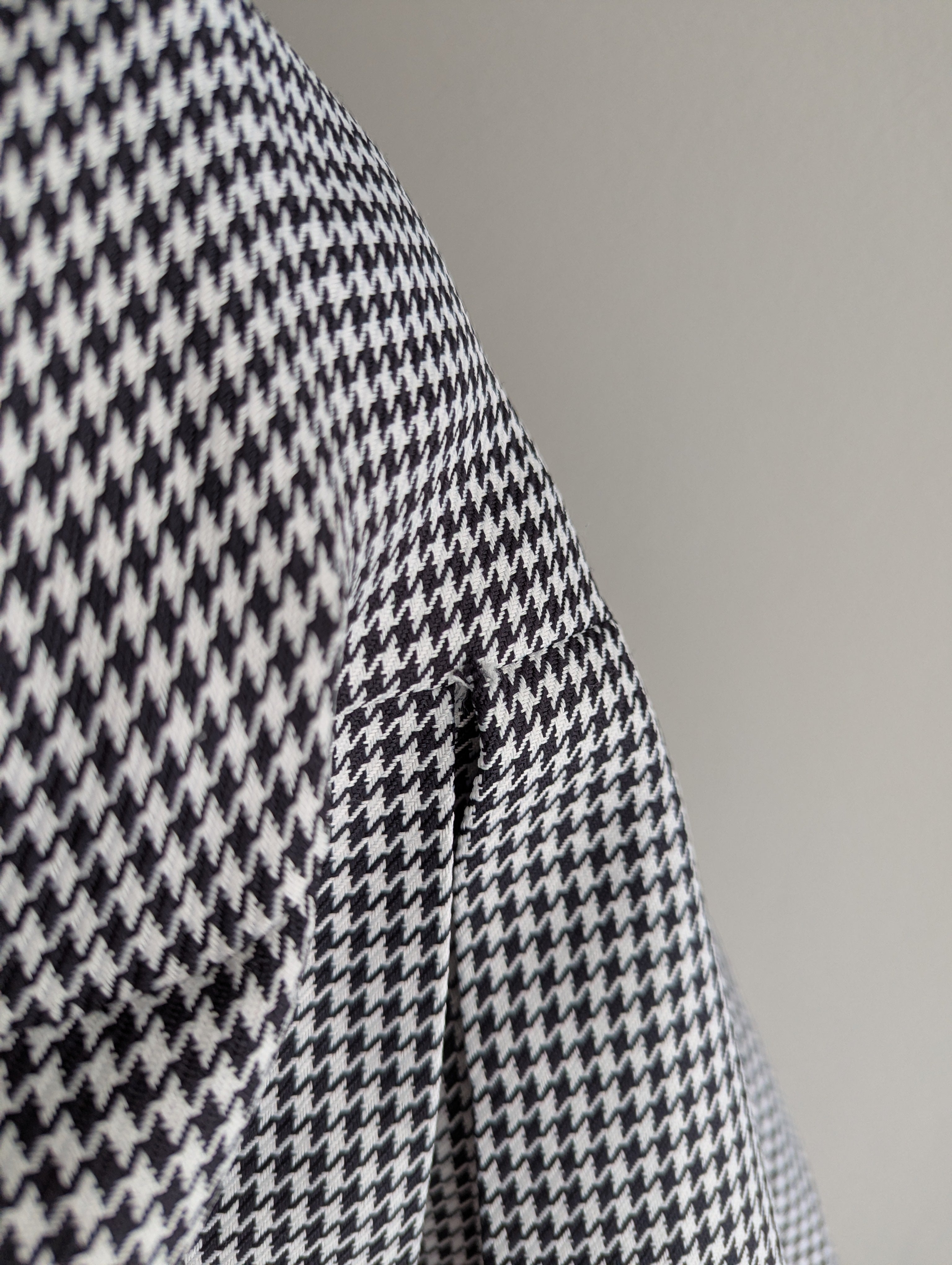 Ally Pleated Houndstooth Mini Skirt
